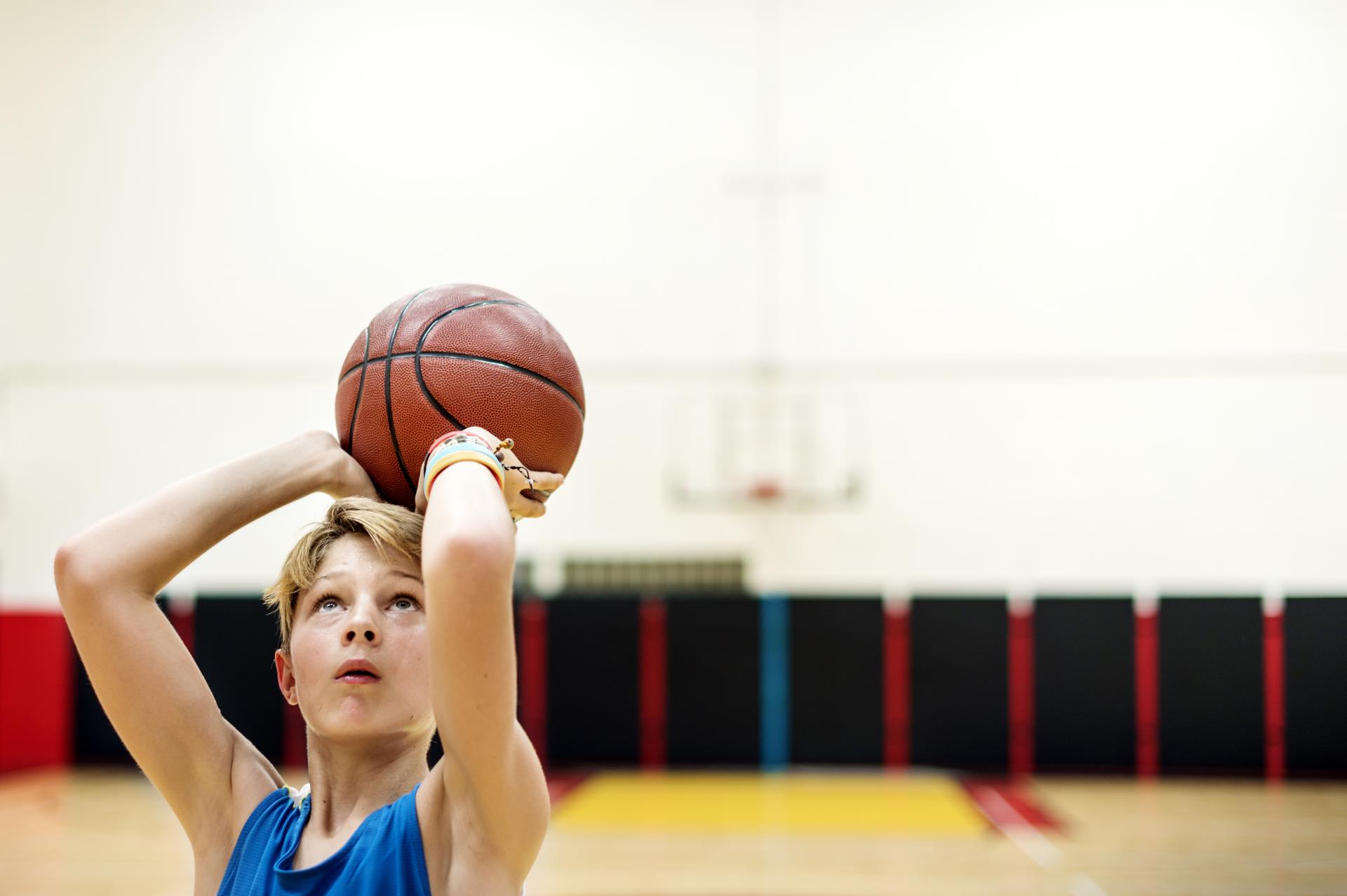 boy playing basketball