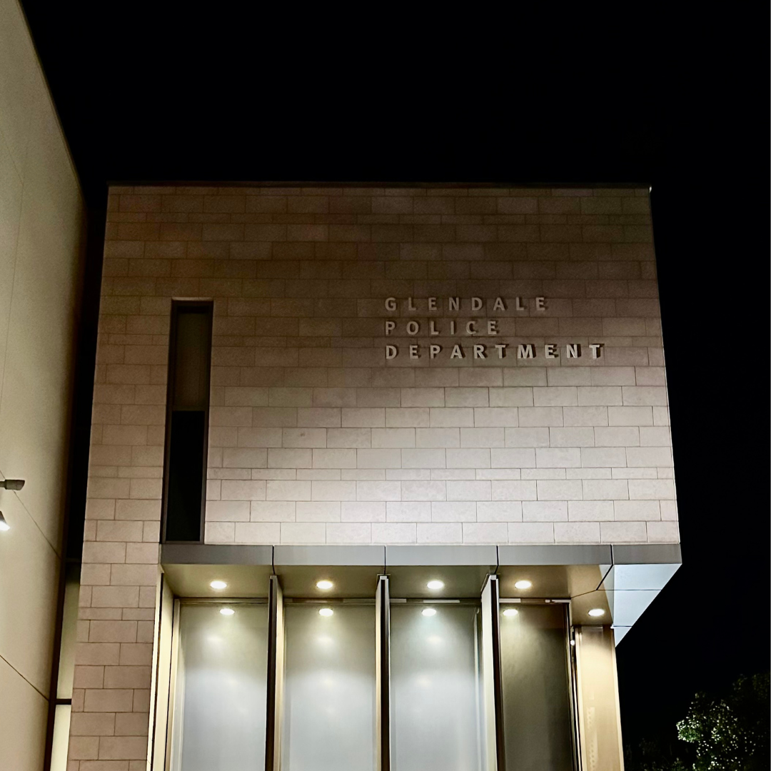 Facade of police station at night